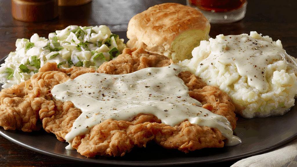 Country Fried Top Sirloin Steak · hand-breaded top sirloin, country gravy, two standard sides, buttermilk biscuit. (gravy is served on the side)
