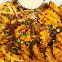 Fry Me To The Moon · fries, waffle fries, cheddar, bacon, scallion (gringo dip or chipotle ranch)