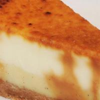 Mini Creme Brulee Cheesecake · new york’s cheesecake, france’s crème brulee custard, caramelized sugar, vanilla cookie crust