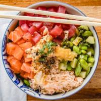 King Poke Bowl · Salmon, tuna, tempura shrimp, snow crab meat, cucumber, edamame, avocado.