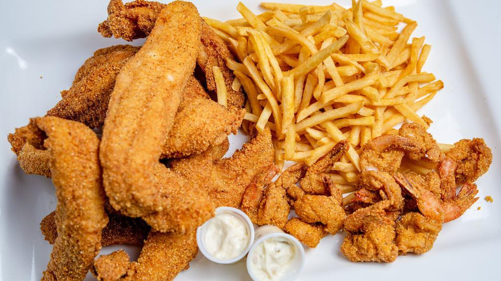 Family Catch 10/10 · Ten pieces fish, ten pieces shrimp, choice of fries, mashed potatoes or dirty rice, and one tartar sauce (additional charge for other sides).
