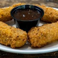Holy Macaroni · At Pluckers, we fry everything- even Macaroni and Cheese.