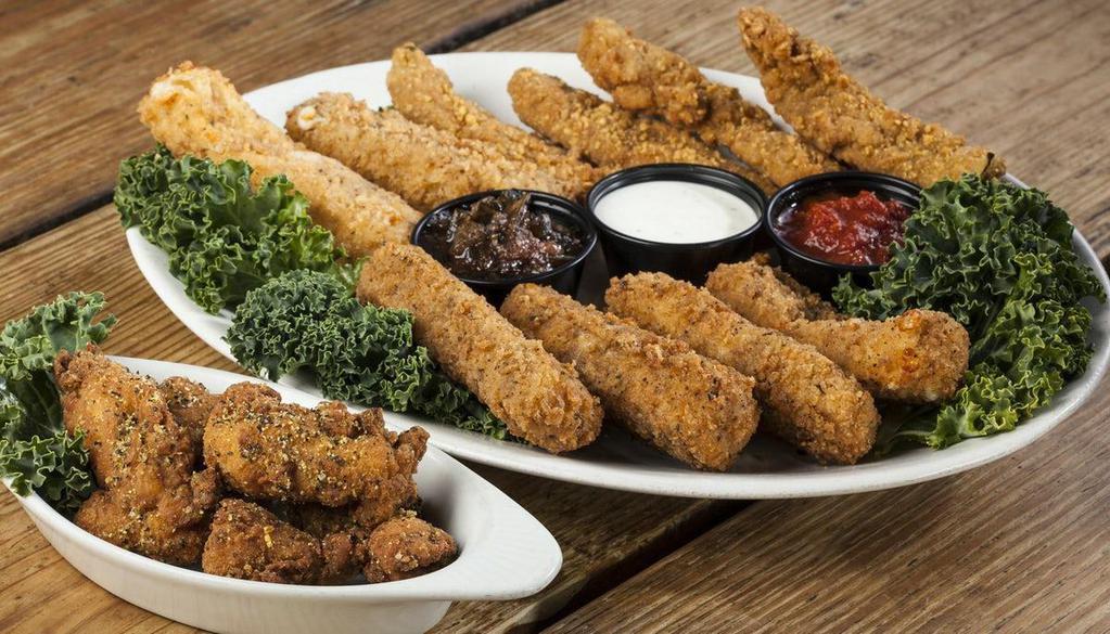Appetizer Sampler · 6 Buffalo Bites, 4 Fried Pickles, 4 Holy Macaroni, and 2 Fried Cheese. Sorry. No substitutions for your dipping sauces online.