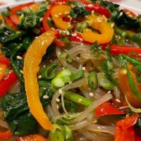 Japchae · Sweet potato noodles with red and yellow peppers, blanched spinach. mushrooms, scallions in ...