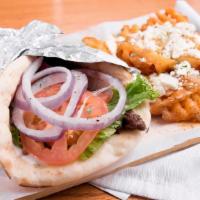 Gyro · Simply tasty juicy beef and lamb gyro meat, lettuce, tomato, onions, and tzatziki sauce.