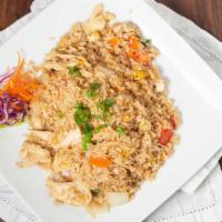 Thai Fried Rice · TRADITIONAL THAI FRIED RICE WITH SCALLIONS, ONIONS, TOMATOES AND EGGS