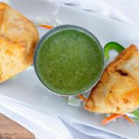 Samosa Set · Two pieces. indian fried puffs.