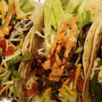 Tacos · Corn or flour tortilla filled with your choice of meat topped with cilantro and onions meats...