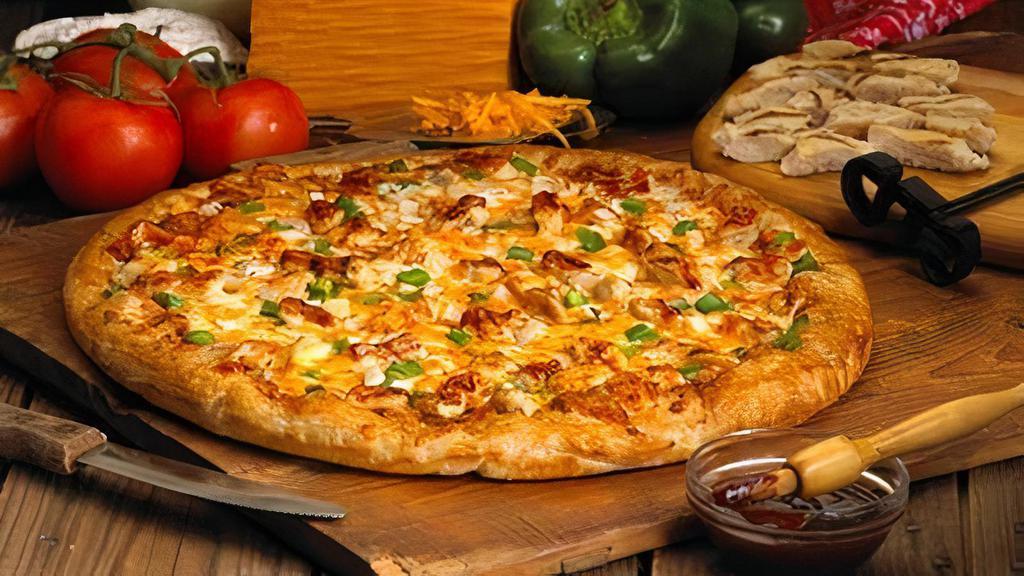 Bbq Chicken (X-Large) · Savor the flavor of this tasty BBQ pizza.  Smokey BBQ sauce, grilled chicken (or beef), onion, green pepper, and mozzarella and cheddar cheese. Cal 96 - 588
