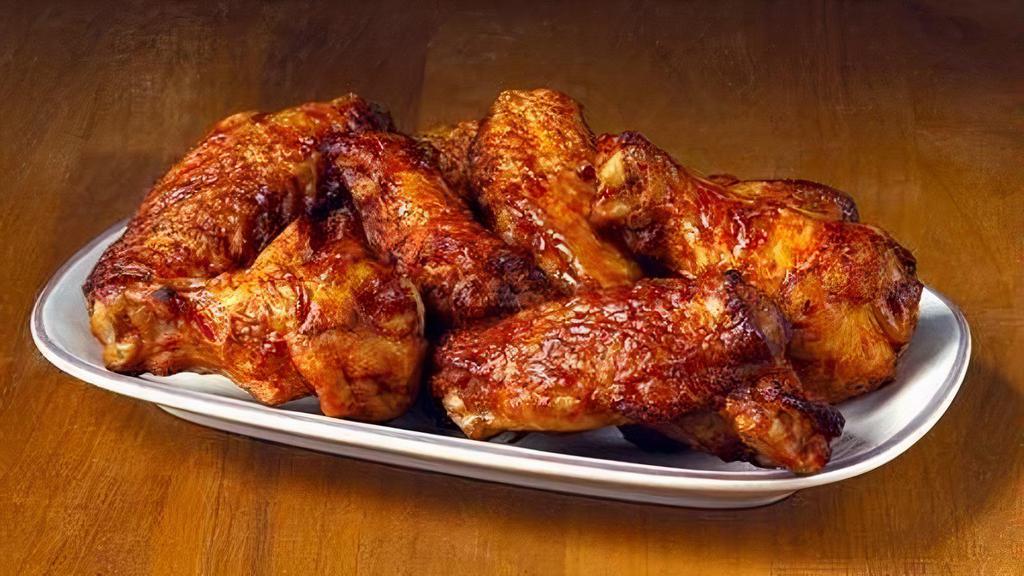 Wings (16 Pieces) · Tasty spicy hot chicken wings.  Also available in BBQ flavor. Served with ranch dressing (other dipping sauces are available).