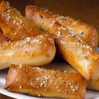 Bread Buds (Regular) · Delightful buds of our famous original crust baked well and covered in garlic butter and Par...