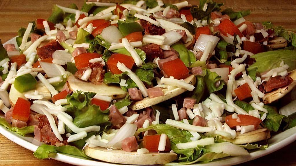 Mrjim'S Special Salad (Dinner Made Easier Feed 4-7) · Comes with fresh lettuce or spinach, tomato, onions, green pepper, bacon, ham, mushroom, and mozzarella cheese. Served with choice of dressing.