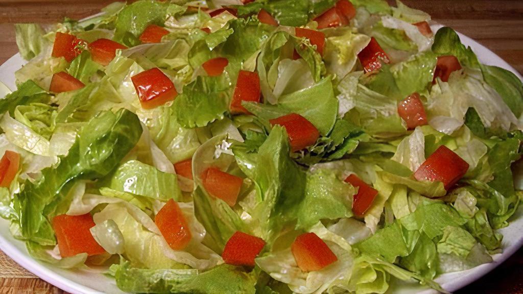 Dinner Salad (Dinner Made Easier Feed 4-7) · Comes with fresh lettuce or spinach and tomato. Served with choice of dressing.