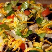 Chicken Fajita Salad (Dinner Made Easier Feed 4-7) · Comes with fresh lettuce or spinach, fajita chicken, onion, cheddar cheese, green pepper, bl...