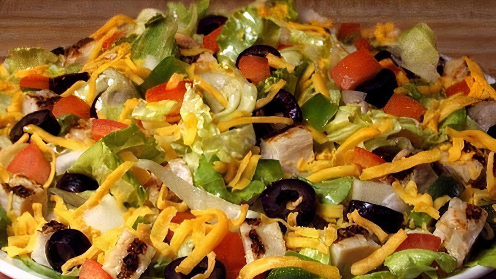 Chicken Fajita Salad (Dinner Made Easier Feed 4-7) · Comes with fresh lettuce or spinach, fajita chicken, onion, cheddar cheese, green pepper, black olive, and tomato. Served with choice of dressing.