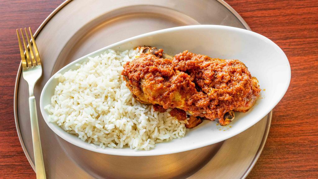 White Rice Dish · White rice served with our signature tomato stew.