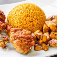 Jollof Rice · White rice cooked in a blend of bell pepper, tomato and onion sauce fried in vegetable oil, ...