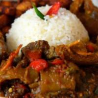 Ayanmase Stew · Served with white rice. And assorted meat
