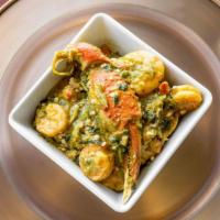 Seafood Okra Soup · Freshly cut okra cooked in a blend of spices, garnished with an assortment of fish, shrimp, ...