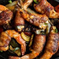 Pacifico Shrimp · (8) Brochette-style shrimp with Mexican panela cheese, jalapeño & bacon wrapped, with guacam...