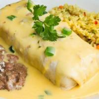 Burrito Con Queso · Loaded with 100% ground beef, smothered in queso.
