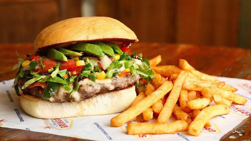 La Bomb-Bah Burger · Housemade, grilled sirloin on sweet sourdough bun with melted cheese, bacon, poblano peppers, avocado, pico de gallo, and amazon sauce. Served with fries.