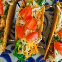 Traditional Taco Dinner · Three of same, ground beef or  salsa chicken -- served crispy or soft.