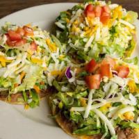 Chalupa Dinner · (3) Chalupas with refritos, lettuce, tomatoes & cheese. Select protein and bean option.