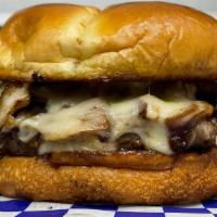 Portobello Mushroom Swiss Burger · Juicy Beef Patty, Applewood Smoked Bacon, Portobello Mushrooms, Caramelized Onion, Swiss Che...