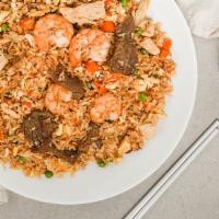 Cơm Chiên Thập Cảm · Combination fried rice with BBQ pork, chicken, beef, shrimp stir-fry egg noodle with shrimp.