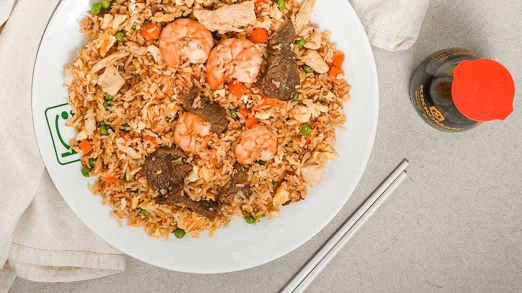 Cơm Chiên Thập Cảm · Combination fried rice with BBQ pork, chicken, beef, shrimp stir-fry egg noodle with shrimp.