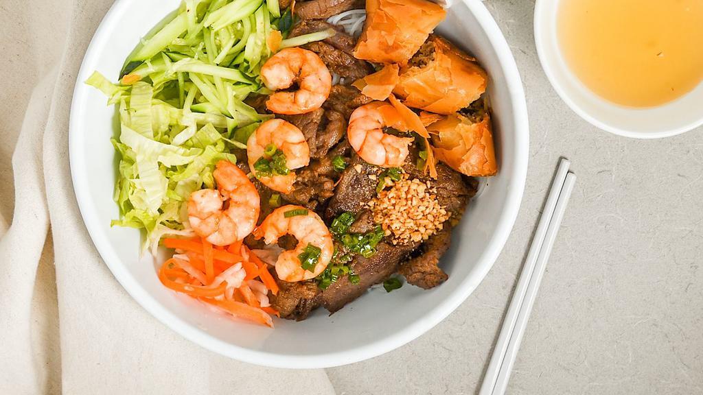 Bún Tôm Thịt Nướng Chả Gi · Charcoal-broiled pork, grilled shrimps, and egg rolls.