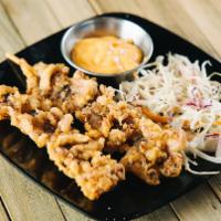 A5 Calamari On A Stick · Deep-fried squid served with Asian style coleslaw.