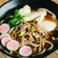 U1 Niku Udon · Udon noodles, Kake sauce broth, beef, white onions, diced green onions, fish cakes, bok choy...