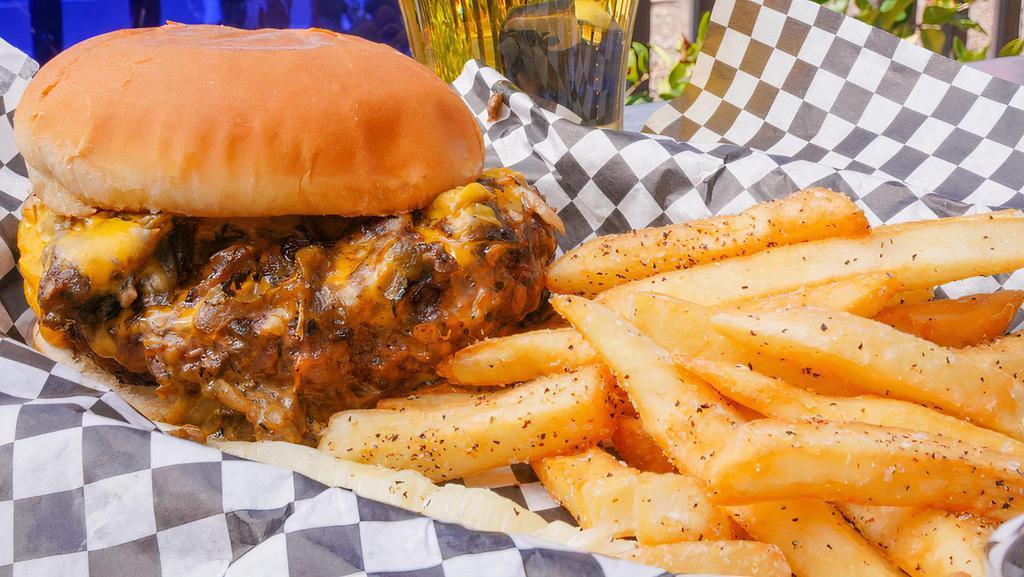 Green Chile Cheese Burger · 1/2 pound burger on a toasted bun topped with roasted Hatch green chile and melted American cheese. Includes house seasoned fries.