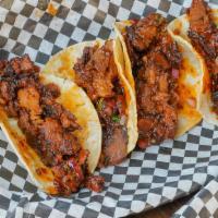 Pulled Pork Wtth Street Tacos (4) · Served on warm corn tortillas and house made salsa