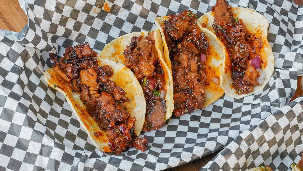 Pulled Pork Wtth Street Tacos (4) · Served on warm corn tortillas and house made salsa