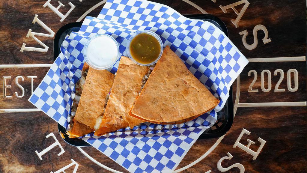Slow-N-Low Pulled Pork Wtth Quesadillas · Your choice of spinach or chipotle tortillas shredded Muenster cheese served with pulled pork topped with BBQ. Served with a side of sour cream and house made salsa