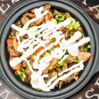 Asada Wtth Mac & Cheese · Mac & Cheese mixed with seasoned asada topped with diced red onions, fresh tomatoes and hous...