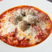 Spaghetti & Meatballs · Spaghetti topped with our fresh made daily tomato sauce, meatballs, and covered with melted ...