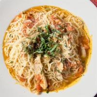 Chicken Pomodoro · Chicken breast sautéed with fresh diced tomato and basil with garlic and olive oil sauce, to...