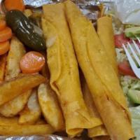 Flautas · Five  flautas, lettuce, tomato, carrots, avocado and french fries.CHOOSE THE MEAT CHICKEN OR...
