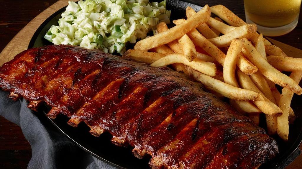 Center Cut' Baby Back Ribs · smoked center cut ribs (full slab), french fries, scratch bbq beans with brisket