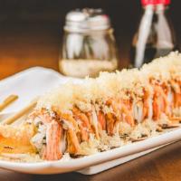 Shaggy Dog Roll (8) · Shrimp tempura and cucumber, topped with imitation krab and crunch. Drizzled with spicy mayo...