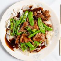 Beef & Snow Peas With Pan Fried Flat Rice Noodle · Noodle dish made from rice flour and water.