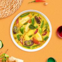 Green Scene Curry · Green curry chili paste simmered in coconut milk with bamboo shoot, bell pepper, basil, and ...