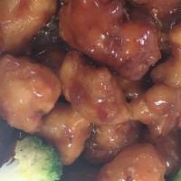 Orange Chicken Spicy · Spicy. Crispy chicken sautéed with orange peel and spicy sauce. Served with egg roll and whi...