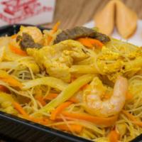Singapore Rice Noodle · Spicy. Served with homemade egg roll and steamed rice.