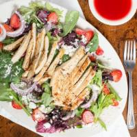 Strawberry Chicken Salad · Fresh mixed greens, fresh strawberries, red onion, Feta cheese, and grilled chicken breast t...
