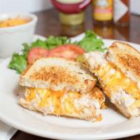 Tuna Melt · Tuna salad with grilled tomatoes and Cheddar cheese on grilled sourdough.